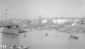 Butterfield and Swire ship 'Shanghai' at Amoy, in front of C.N. and Co. building