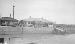 Houses beside river, Canton