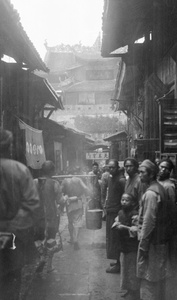 Water carriers in a street in Chungking