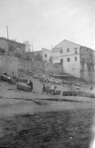 Cargo on riverbank, Ichang