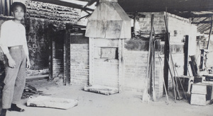 A worker at a crude furnace, China Mining & Metal Company Ltd., Shaoguan (韶關)