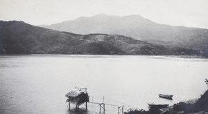 View of Tai Mo Shan (大帽山) and a fishing platform in Gin Drinkers Bay (醉酒灣), Hong Kong