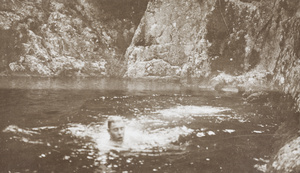 A man swimming near Tai O (大澳), Lantau Island (大嶼山), Hong Kong