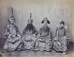 Four opera actors in costume