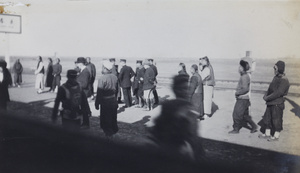 Passengers on railway station platform