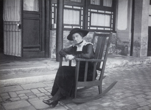 A woman in a rocking chair