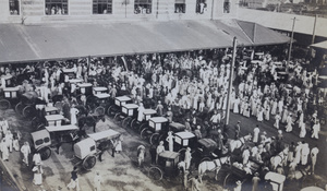 Crowds awaiting a VIP visit, East Qianmen Railway Station, Peking