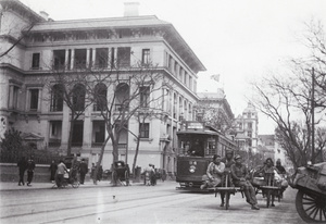 A tram, wheelbarrows and rickshaws, the Bund, Shanghai