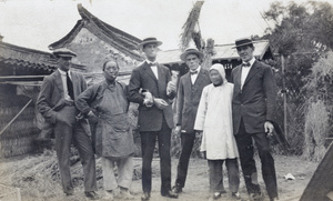 Three foreign men on an outing from Shanghai, with two Chinese women