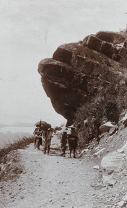 A sedan chair on a mountain path, near Kuling