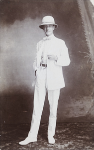 Studio portrait of Charles W. Wheeler (1879-1978), with a cigarette