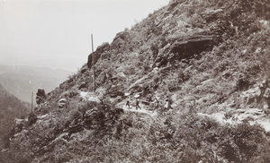 A sedan chair on a mountain path, near Lushan