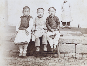 Three boys on a bench