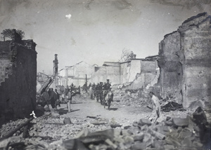 Revolutionary soldiers going through ruins of Wuchang