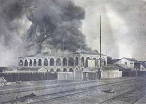 Likin (internal transit tax) offices on fire, near the railway station, Hankow