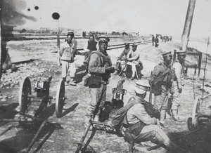 Qing army soldiers beside railway tracks