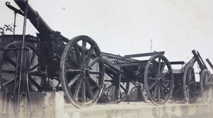 Qing army guns on a railway wagon