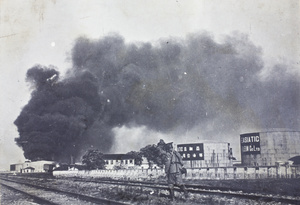 Standard Oil Company holding tank set on fire by a Qing navy shell