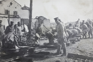 Qing army troops laying light railway track through Hankow