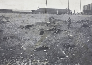 Bodies of Republican and Qing soldiers on a railway embankment after a battle