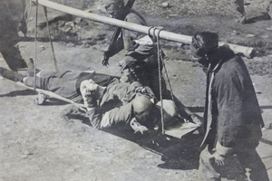 Carrying a wounded Republican soldier to hospital